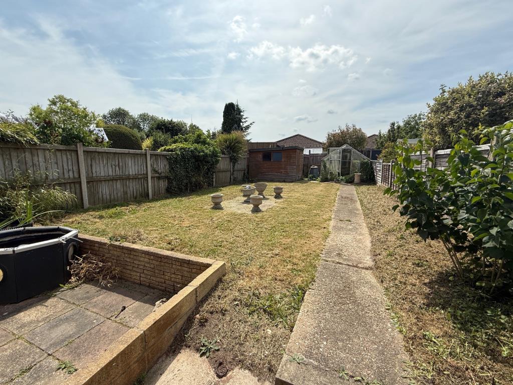 Lot: 149 - SEMI-DETACHED HOUSE FOR IMPROVEMENT IN POPULAR RESIDENTIAL AREA - Rear Garden and patio